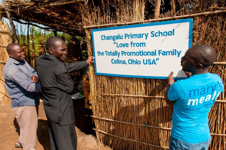Mary's meals staff hanging sign