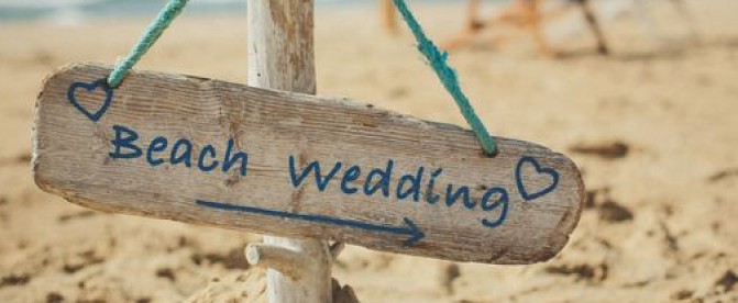 beach wedding arrow sign