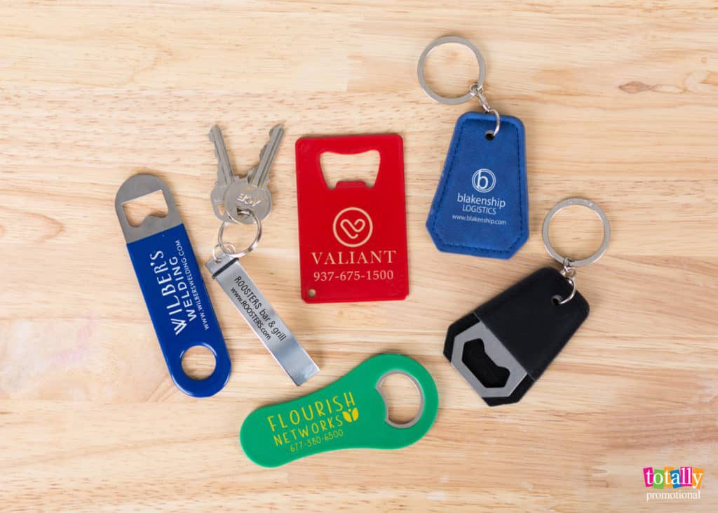 business card alternatives, bottle opener business cards and keychains