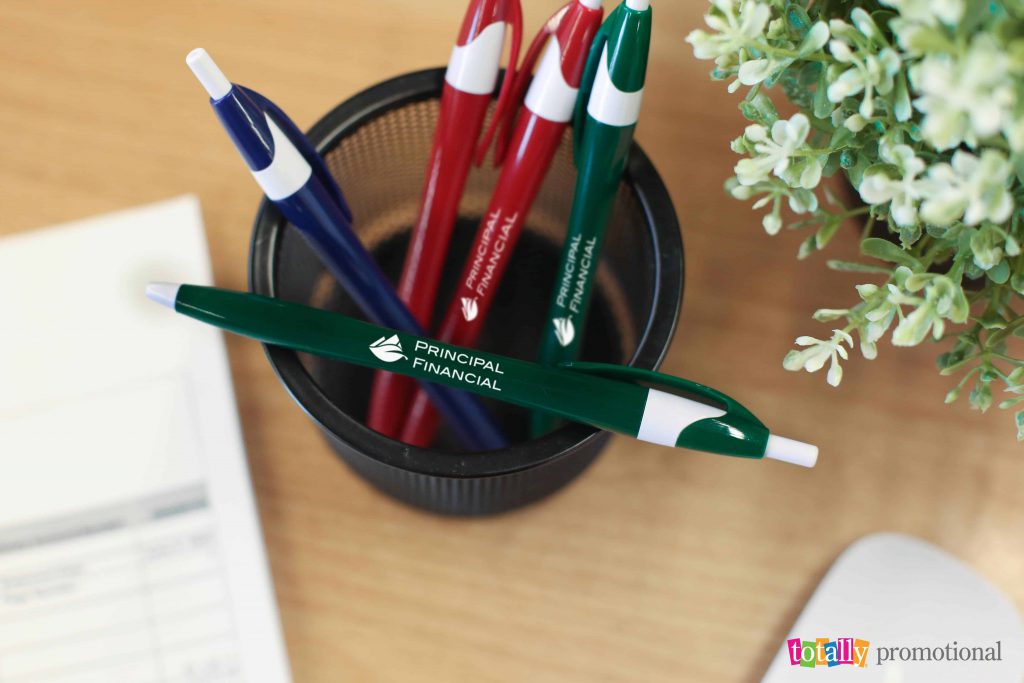 custom pens displayed on a desk