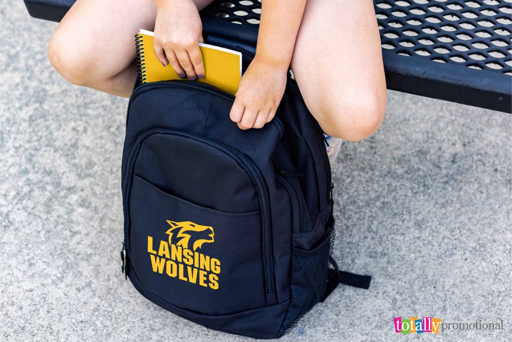black custom backpack with yellow school logo