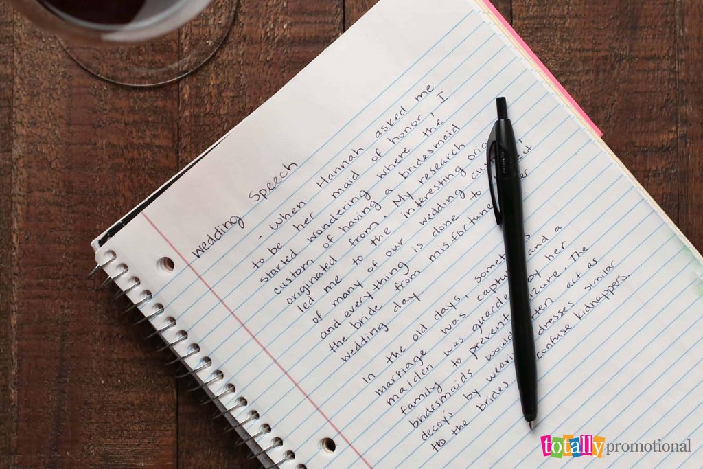 wedding speech draft on a notebook