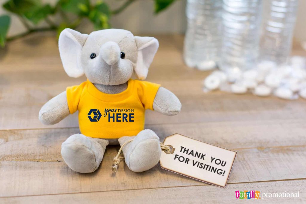 a stuffed animal with thank-you card