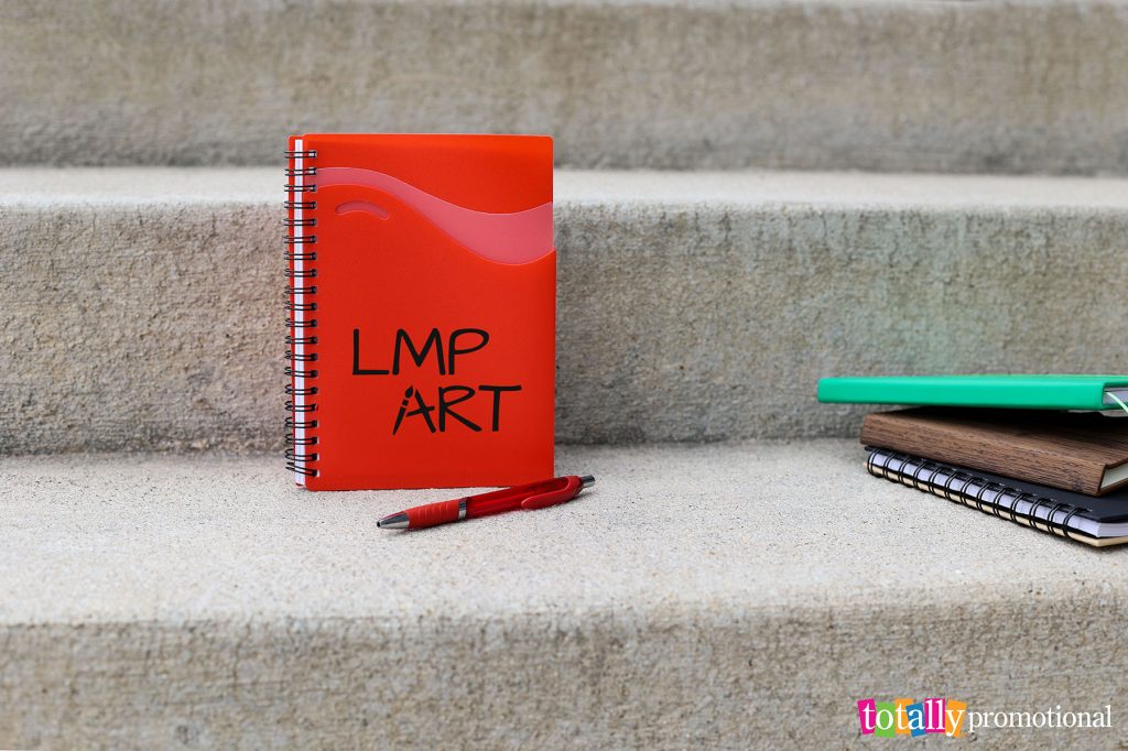 custom red soft-cover notebook with flexible cover