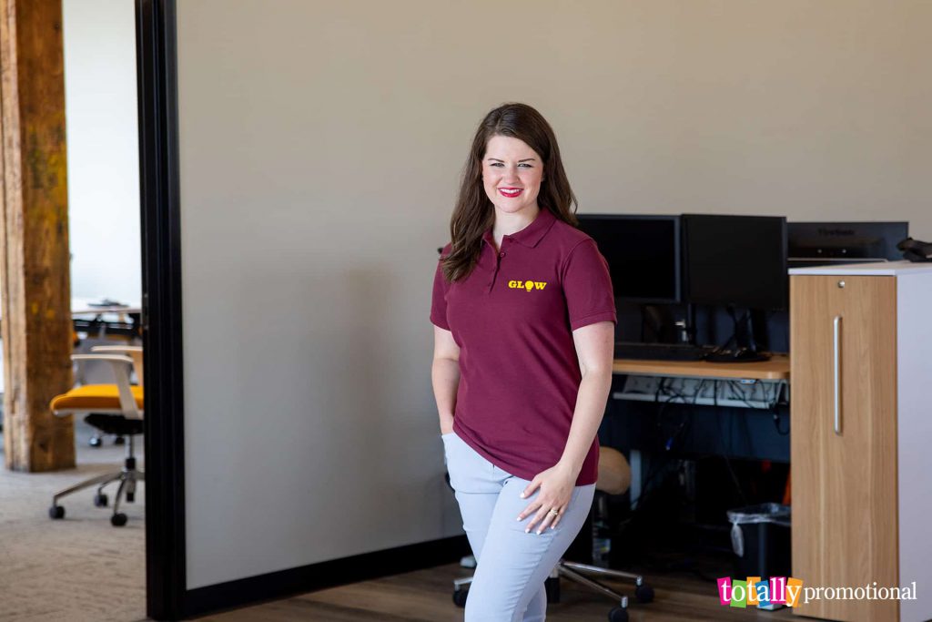 woman wearing a customized business polo