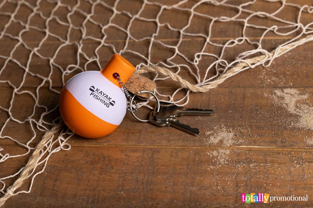 customized floating bobber keychain by a net