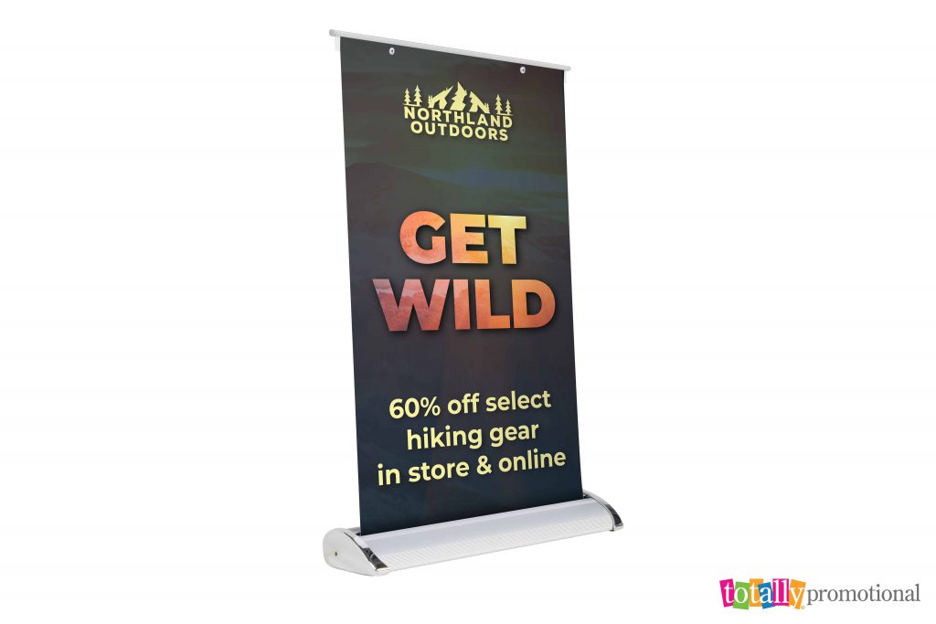 tabletop banner advertising a sale for an outdoors store