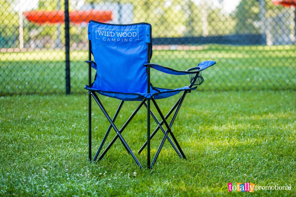 promotional camping folding chairs at a baseball diamond