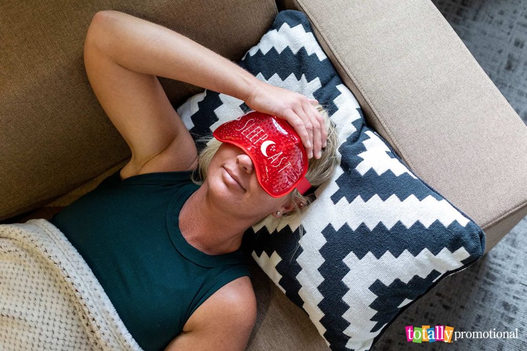 woman wearing a customized eye mask hot and cold pack