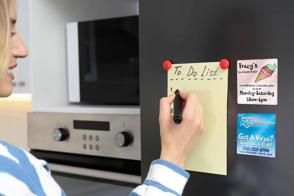 refridgerator magnets with woman writing on a to do list