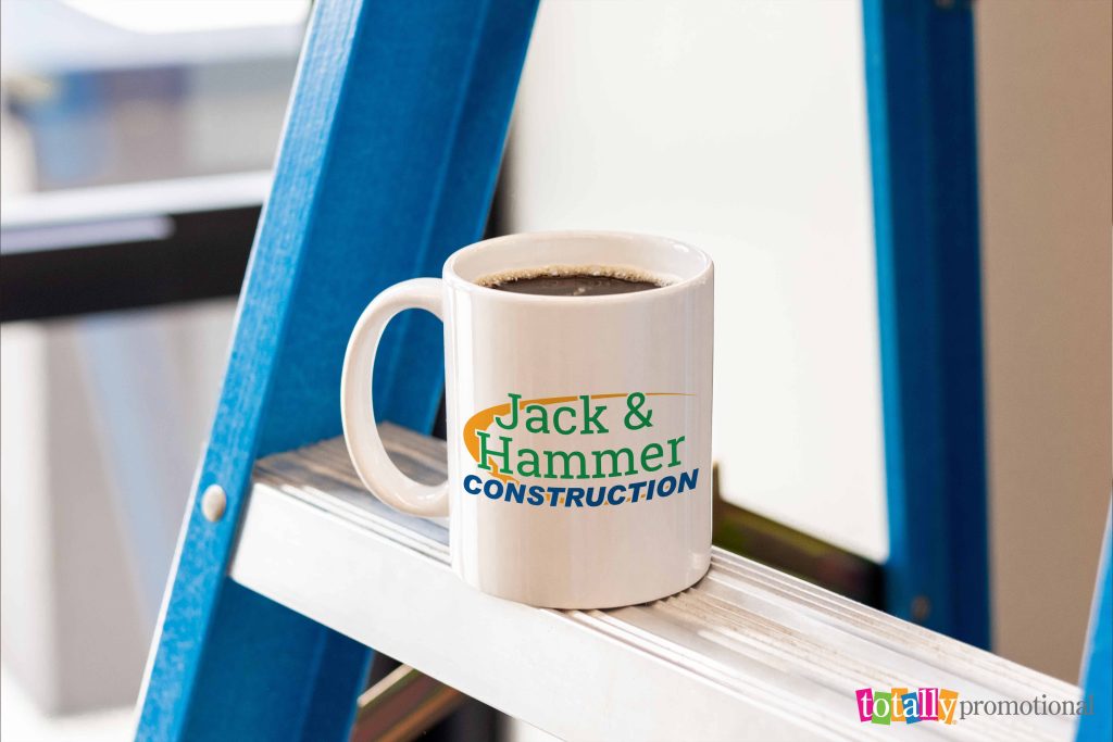 custom coffee mug with a construction logo on a ladder