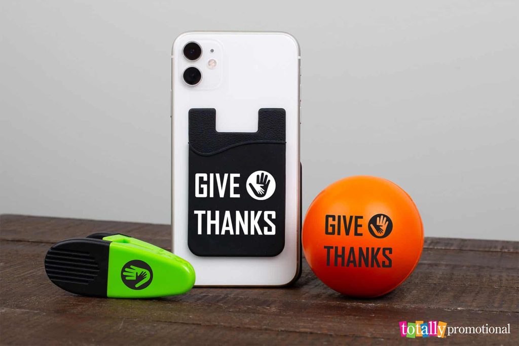 various promotional items with a give thanks imprint