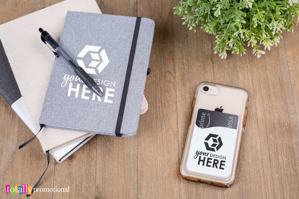 customizable cell phone wallet and notebook promotional products