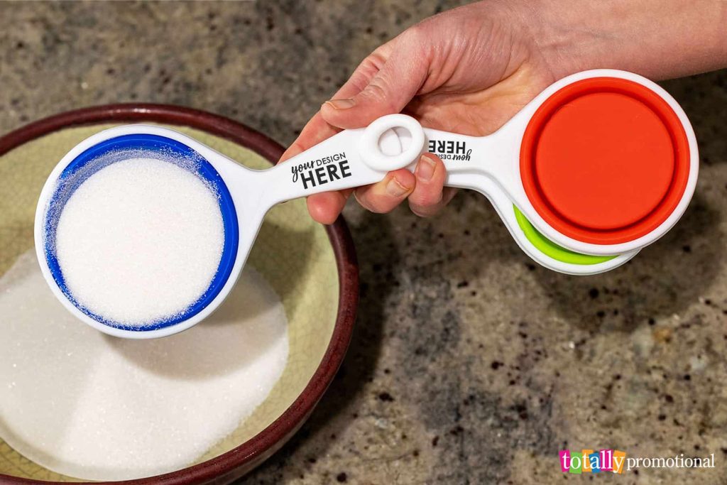 using promotional measuring spoons to cook