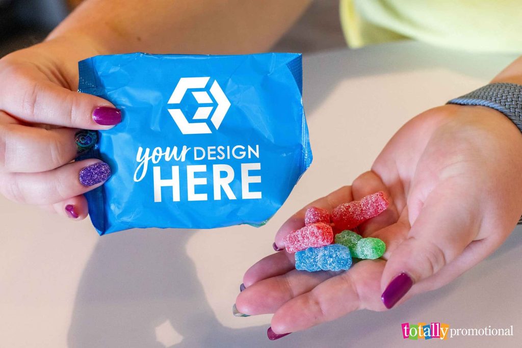 woman holding customizable sour patch kids