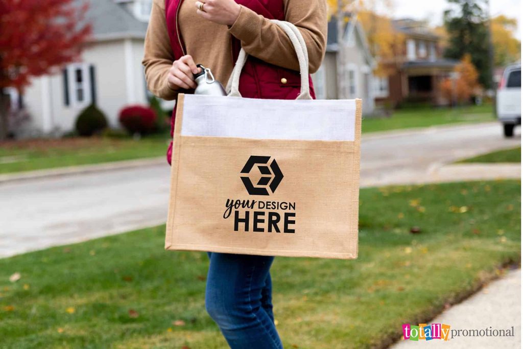 woman carrying a customizable eco-friendly tote bag 